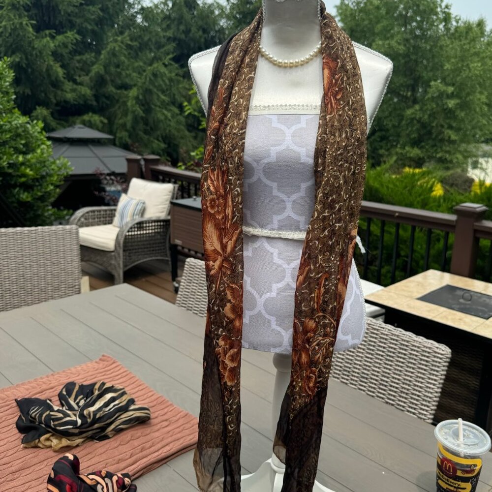 Vintage sheer floral scarf in rich chocolate brown, olive, and gold tones. Featu